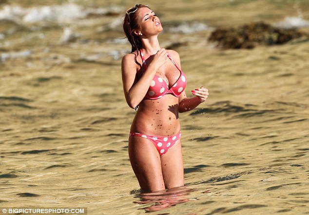 Amy Childs cools off in the warm Spanish sunshine