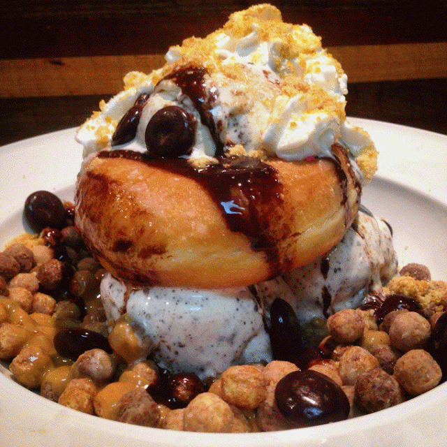 "Birthday" Sundae with Glazed Donut, Junior Mints, Reese's Puffs and Peanut Butter and Chocolate Sauces "Birthday" Sundae with Glazed Donut, Junior Mints, Reese's Puffs and Peanut Butter and Chocolate Sauces