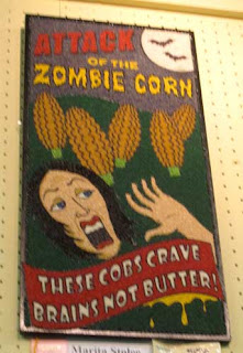 Attack of the Zombie Corn, looks like a 50s horror poster, colorful with dyed seeds