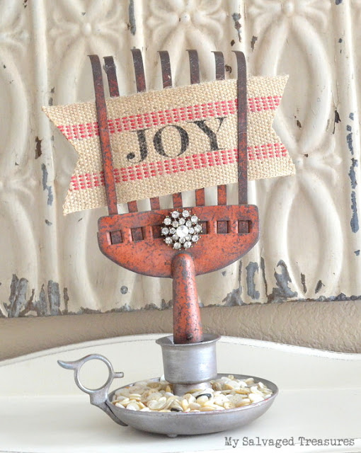 Repurposed rusty rake DIY candle holder with jute webbing