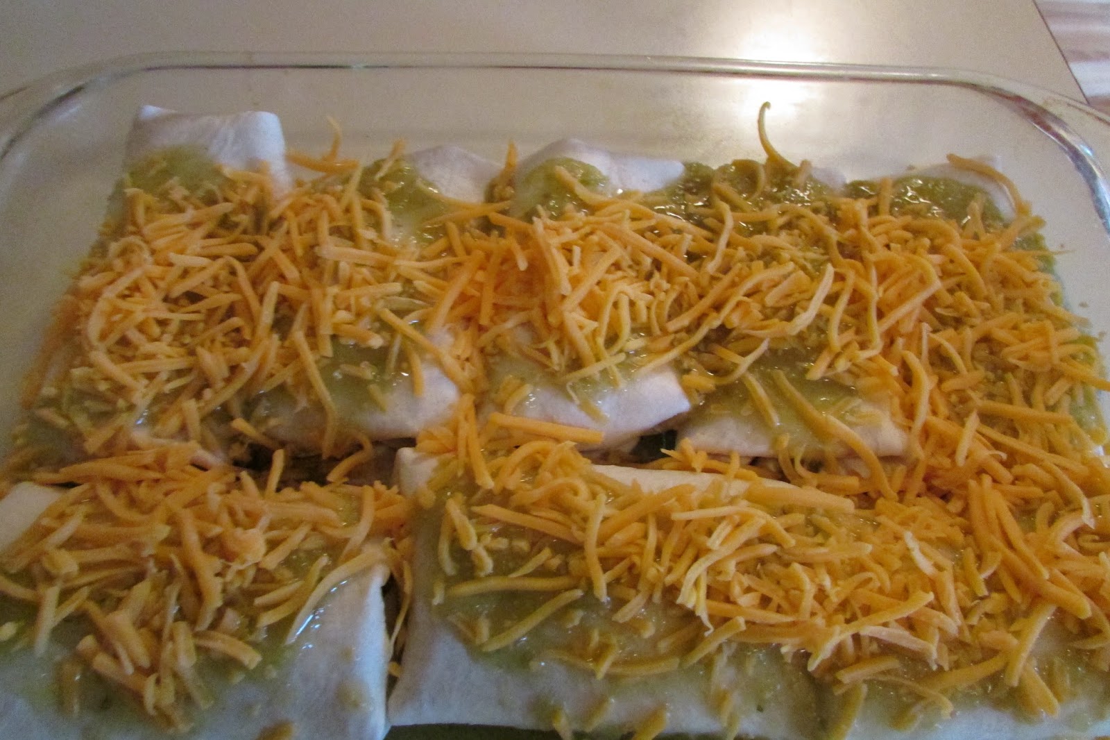 Foodie Mom Pulled Pork Enchiladas with Spinach and Mushrooms