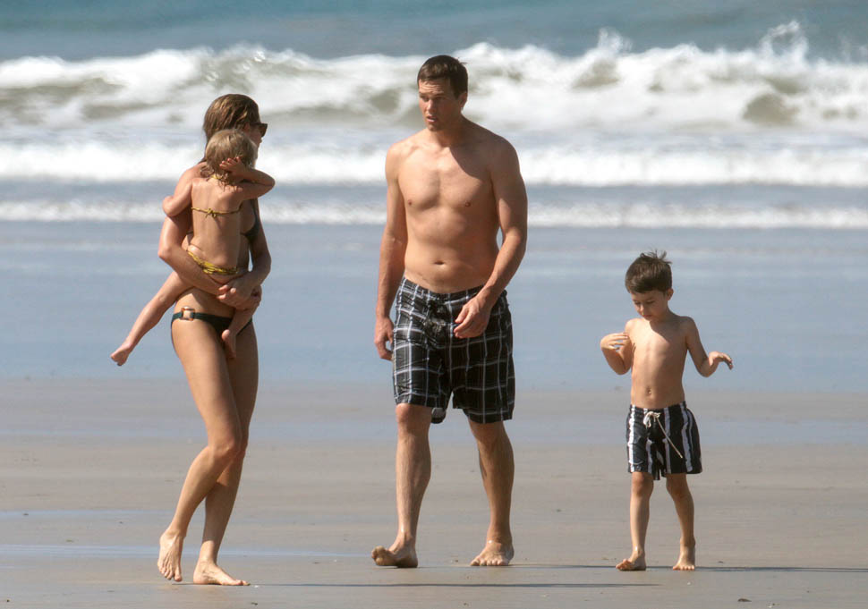 Tom Brady apparently needs someone to play catch with on the beach.