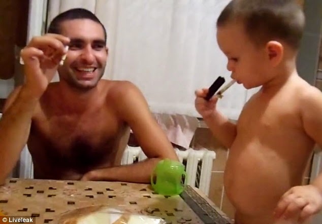  Father Shows His 3 Year Old Son How To Smoke Cigarettes While His Mother Tapes It [Photos + Video]