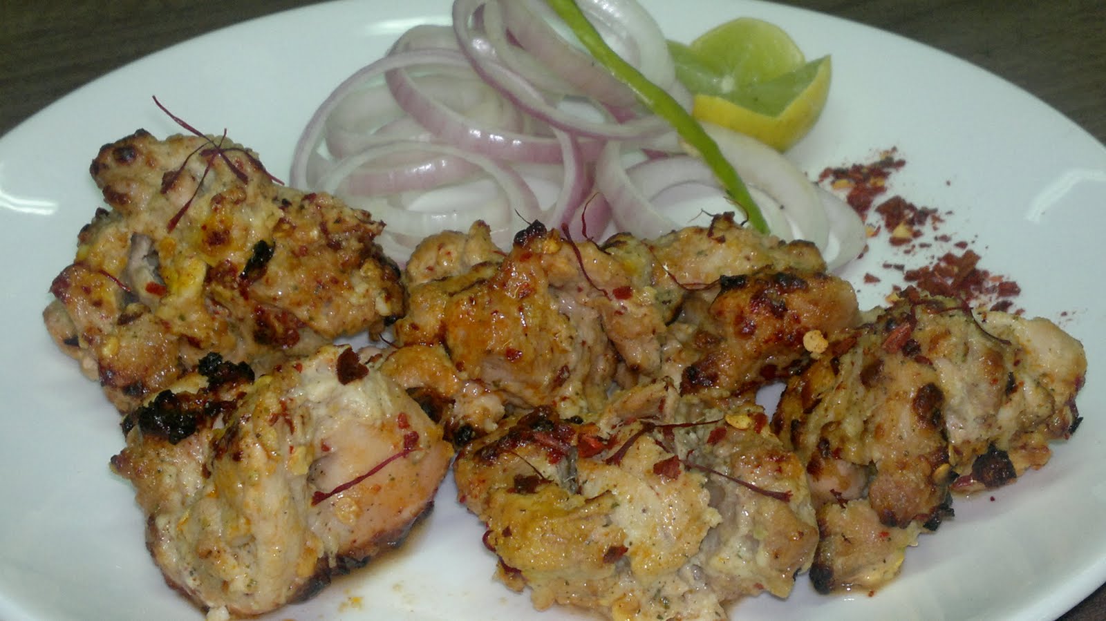 MENU ZAFRANI MURGH MALAI KEBAB IN RED CHILLI FLAKES