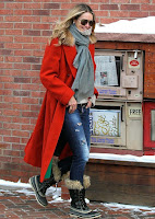 Absolutely retro in a red waiscoat, jeans, and matching boots, there is no doubt that the combination will sell like delicious cakes when the stunning brunette, Elle MacPherson, 51, was snapped walking alone at the street in Aspen, CO 81611, USA on Friday, December 18, 2015.