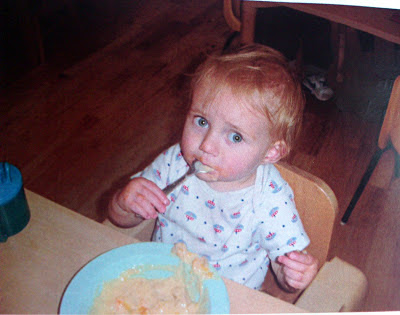 Toddler eating custard cute