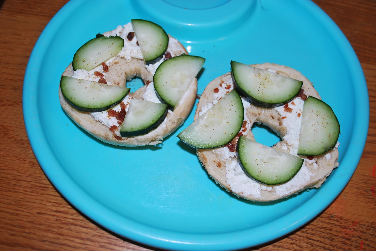 Cream cheese, bacon, cucumber breakfast bagel