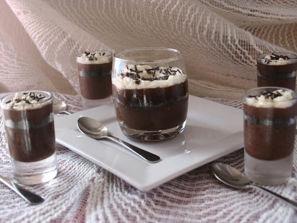 Layered Crushed Oreo Cookies and Chocolate Mousse with Cream