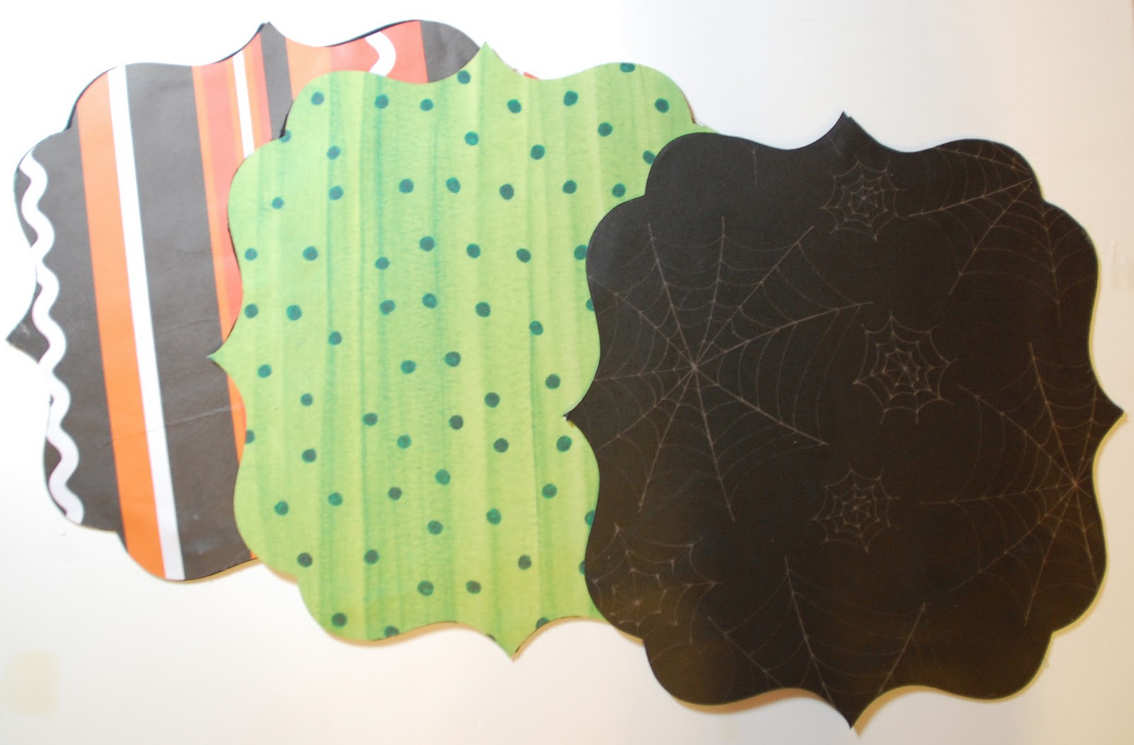 I covered the chipboard with Halloween paper!