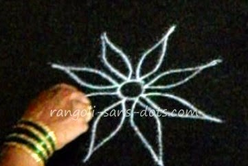 first stage of rangoli draw the petals rangoli-simple-2210a.jpg