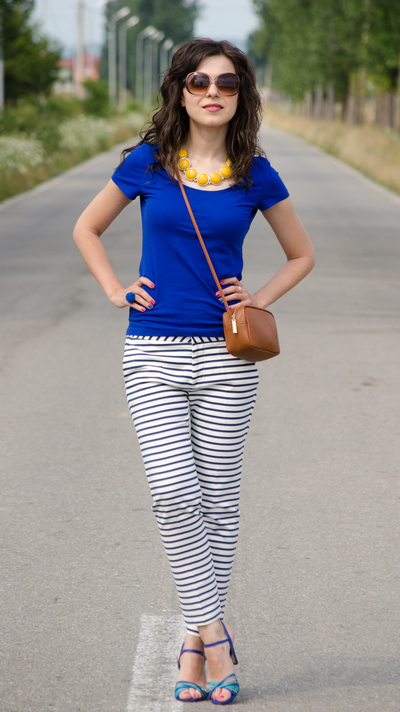 zara navy stripes pants H&M blue t-shirt brown satchel mustard statement necklace poema