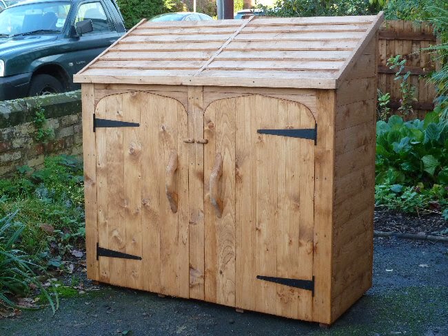 Enclosed log store Log store with doors