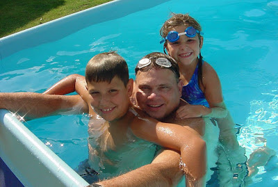 Husband and kids in the pool
