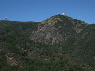 Moon setting behind the summit of Mt. Umunhum