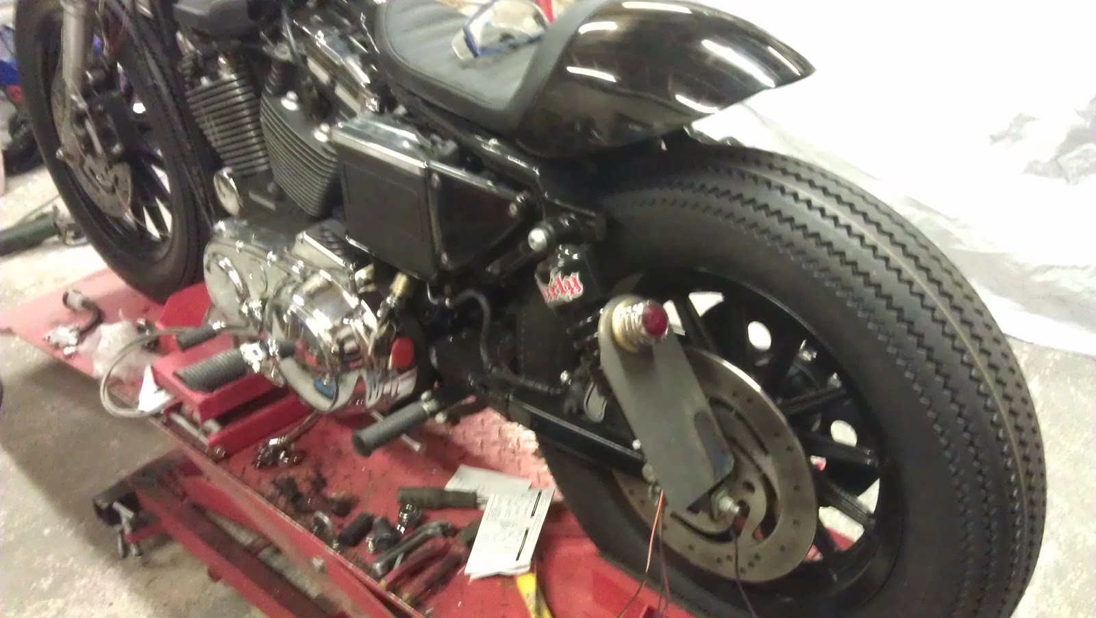 down and out cafe racers number plate side mount and 70s brake set up