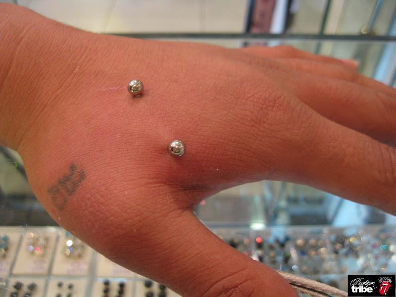 Hand piercing title=