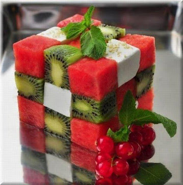 TOWER OF GOAT DICE OF CHEESE, KIWI, WATER MELON, RASBERRY, CHESTNUT