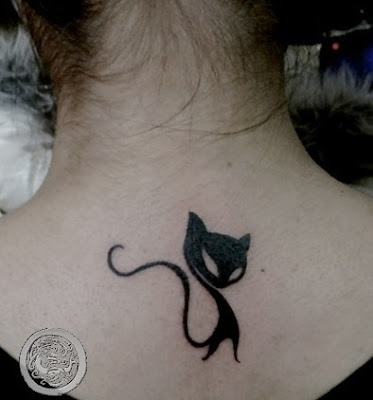 cat tattoo design on the back