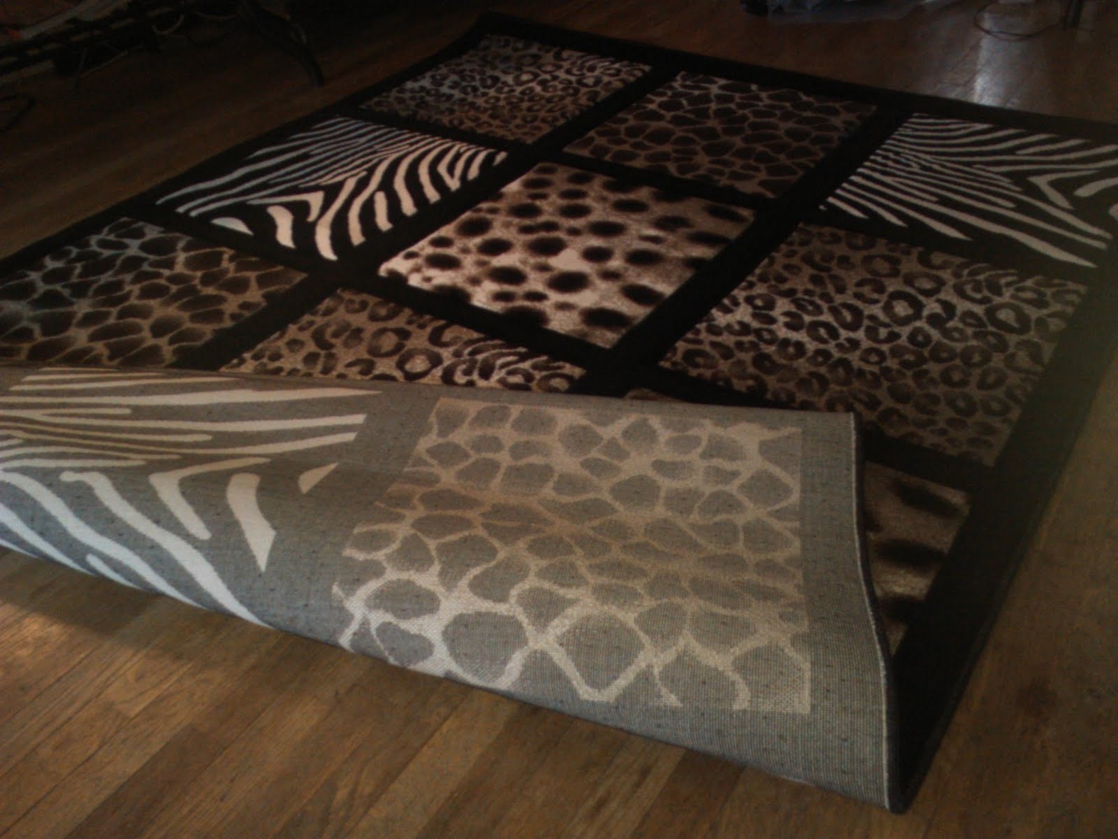 Large Area Rug with leopard/zebra/cheetah print 4 ft x 6 ft Free