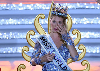 The new Spanish beauty queen, Mireia Lalaguna Royo, 23, is a young pharmacology student from Barcelona, who has captured the crown in tears and applause among 114 candidates at Sanya island in Hainan, China on Saturday, December 19, 2015.