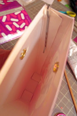 using a bobby pin to keep the box closed while the glue dries