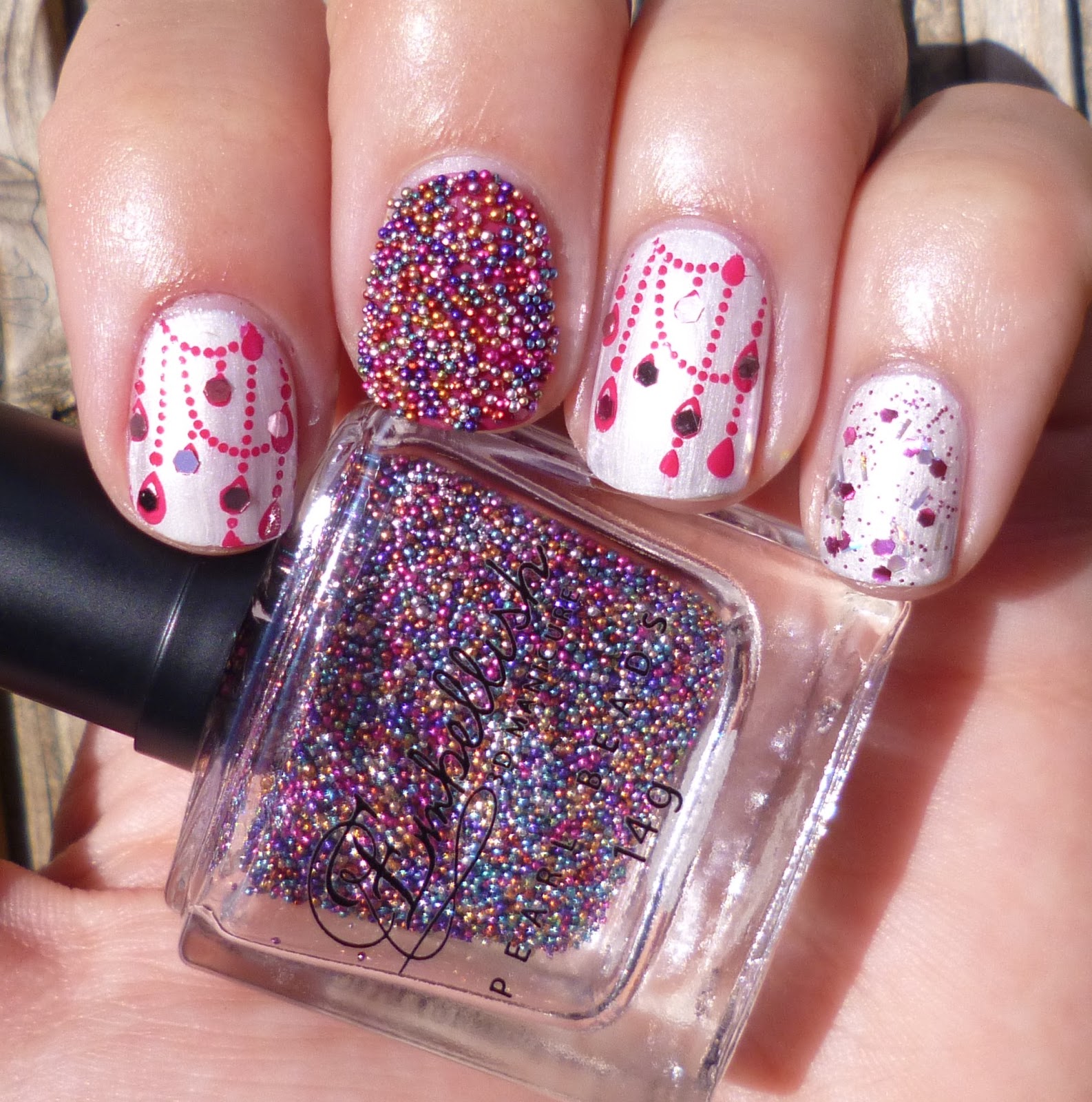 Lou is Perfectly Polished Caviar and Chandelier nails