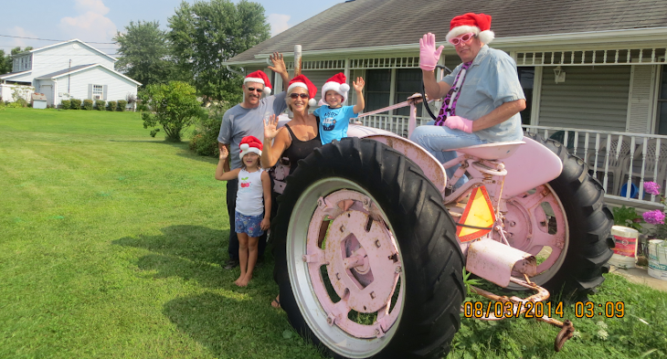 The Blog Cam guy on Pink Farmall got a deal on used Santa hats at the Andover Ohio flea market.