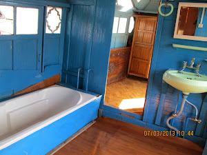 A "5-Star Houseboat" accommodation on Dal Lake.