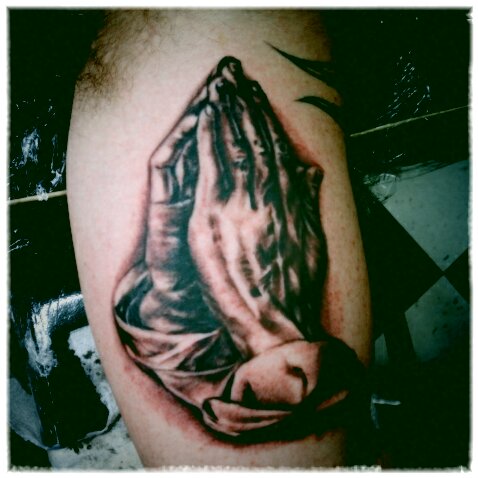 praying hands tattoo for men