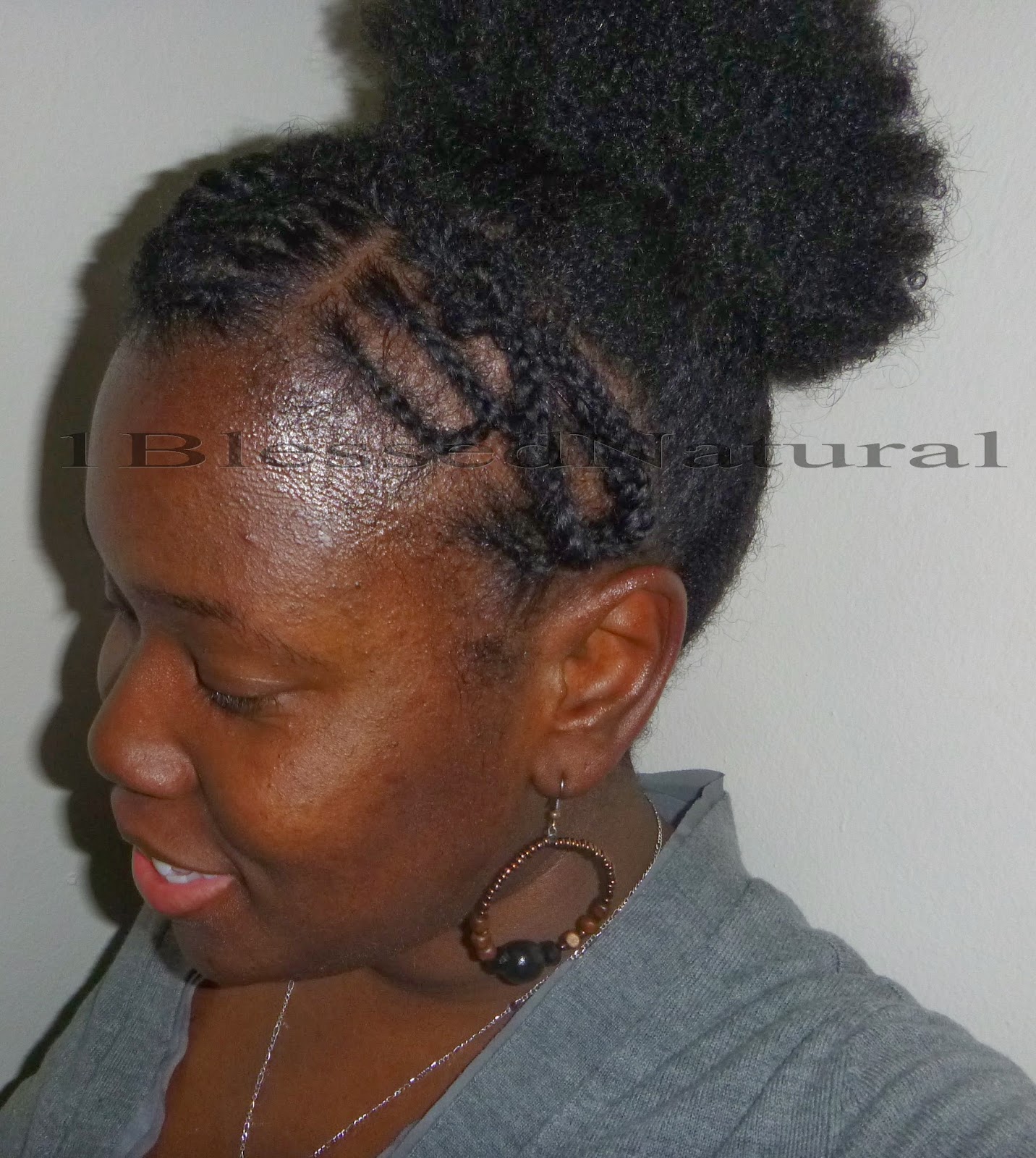 Eritrean Inspired Hairstyle: Front Cornrows, Twists, and Puff