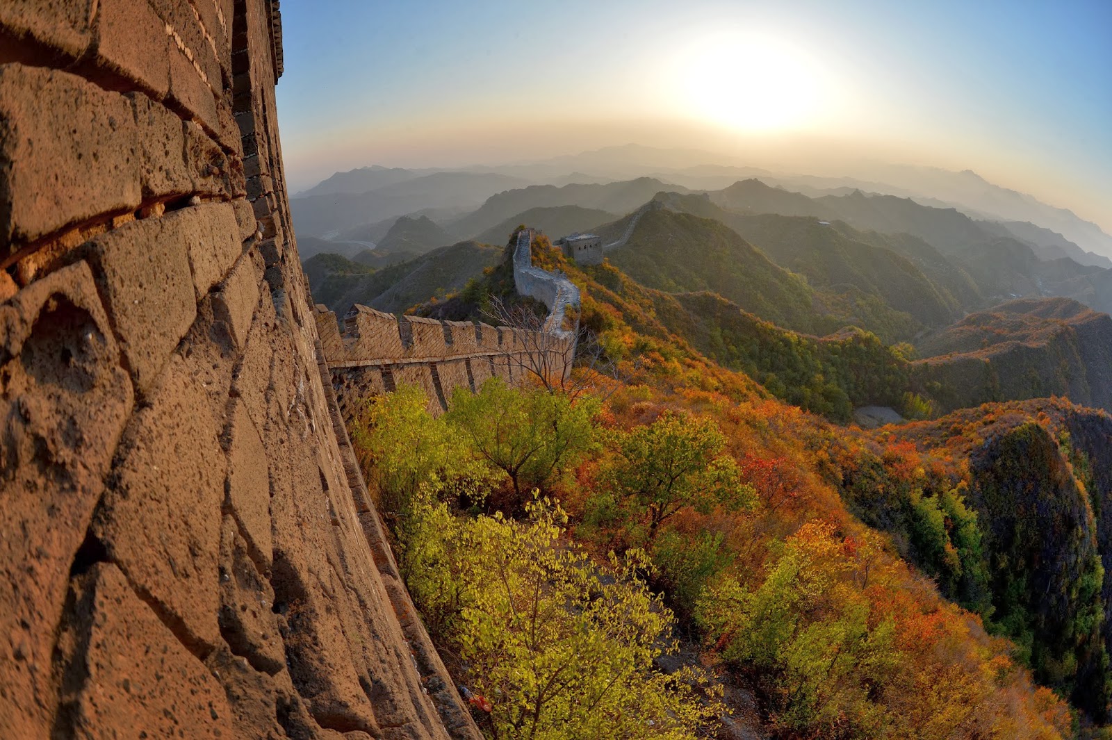 Great Wall of China made of stone, brick, tamped earth, wood, and other materials generally