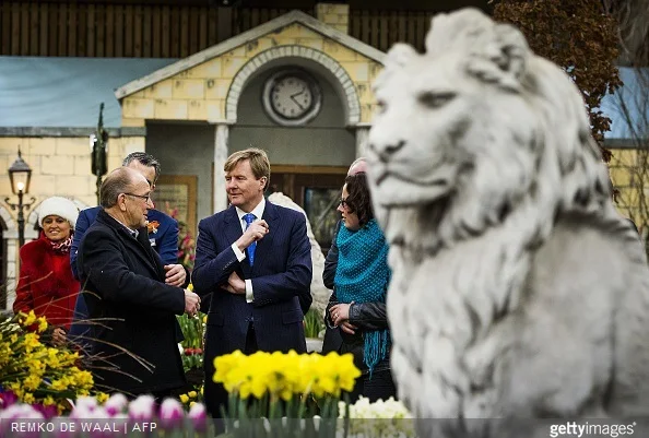 Dutch King Willem-Alexander speaks with flower bulb growers during the opening of the 35th edition of 'Lentetuin Breezand' (Breezand Spring Garden) in Breezand