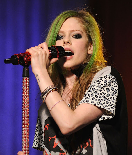 Avril Lavigne Keep Holding On Album. tattoo avril lavigne 2011