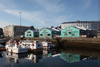 Restaurants and reflections at reykjavik harbour