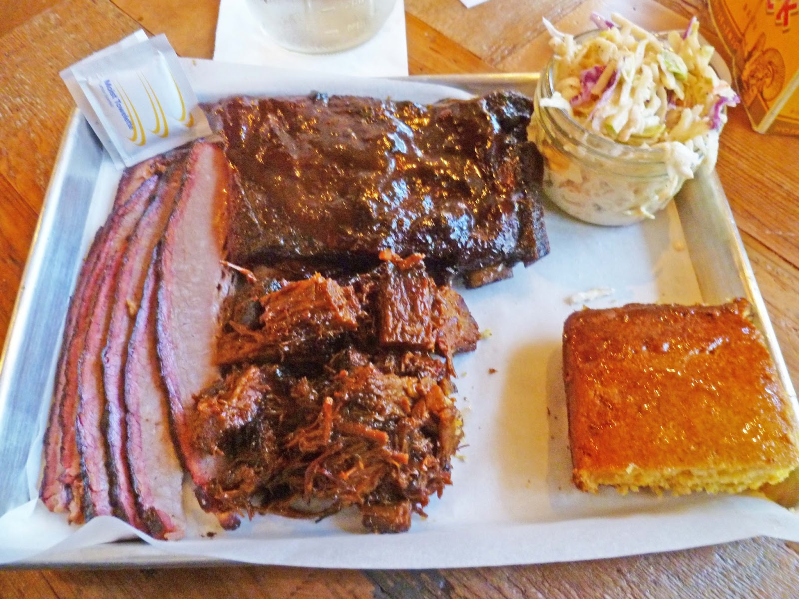 MAD MEAT GENIUS SAUCED BBQ & SPIRITS