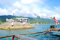 Arrival of motor boat at the pier of Poblacion, Rapu - Rapu Albay