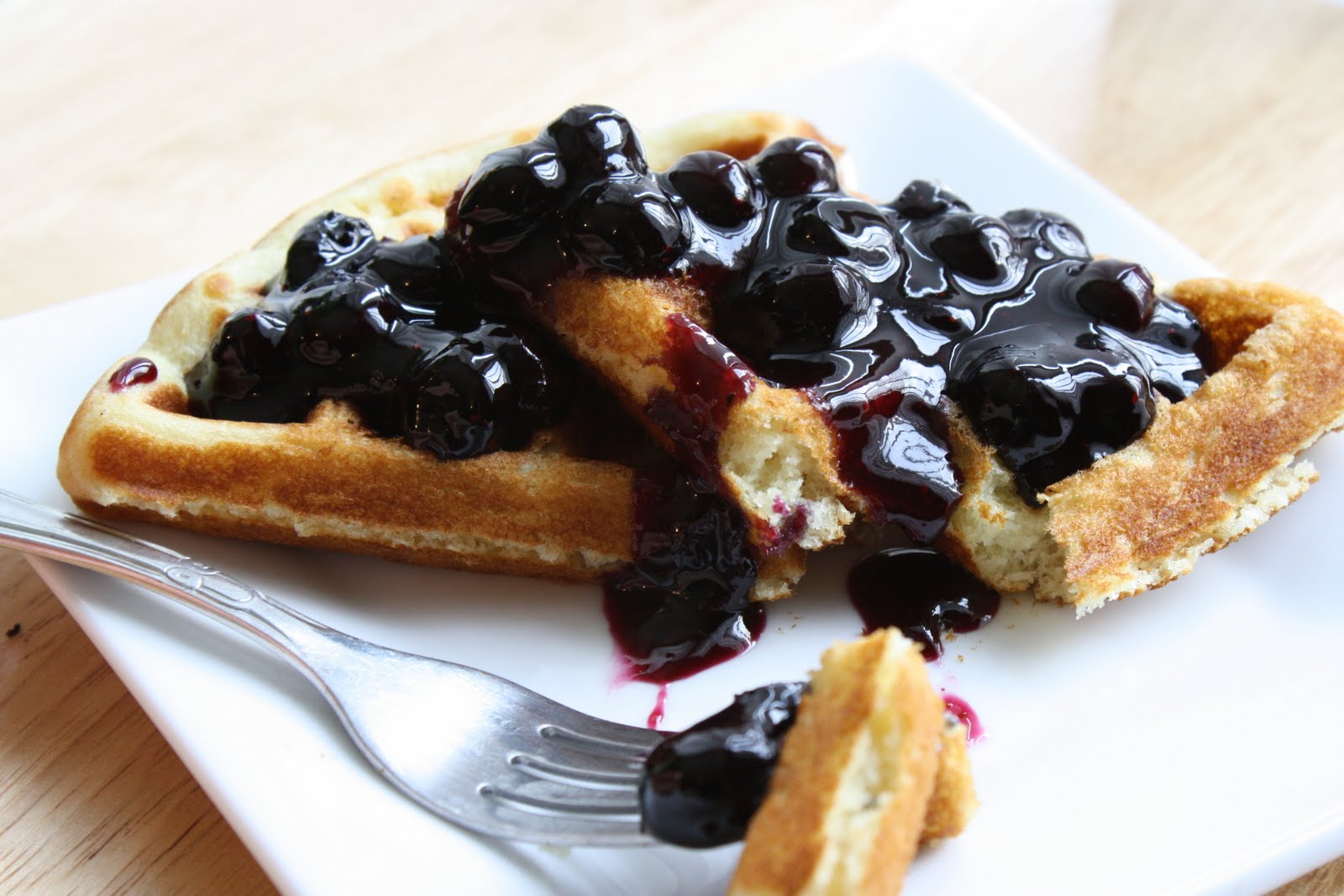 Gourmet Homemade Waffles with Fresh Blueberry Sauce