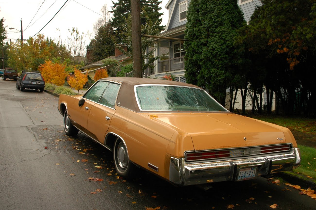 OLD PARKED CARS. 1976 Chrysler Newport Custom.
