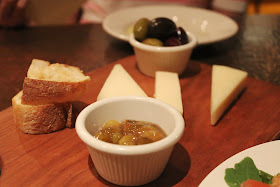 Mixed olives and imported cheeses at Piattini Wine Cafe