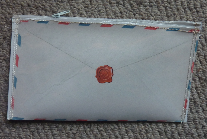 Jovial Spondoodles Sewing with laminated paper, and vinyl wallets from