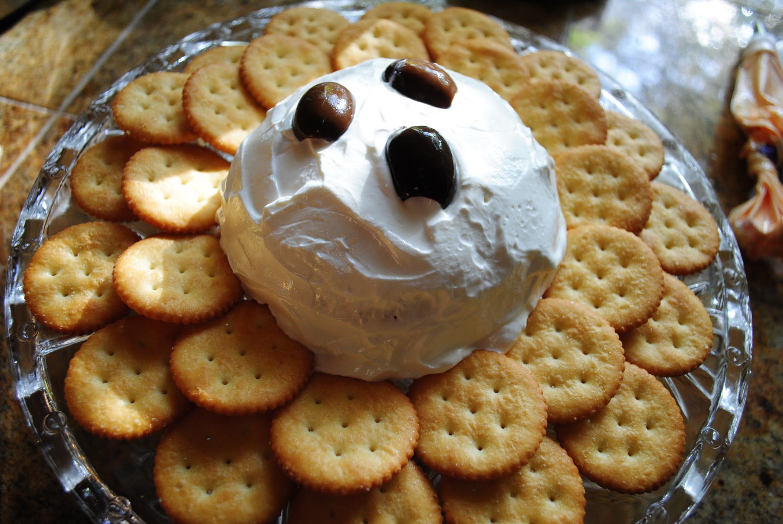 Halloween Treats Spooky Ghost Cheese Ball with Crackers The