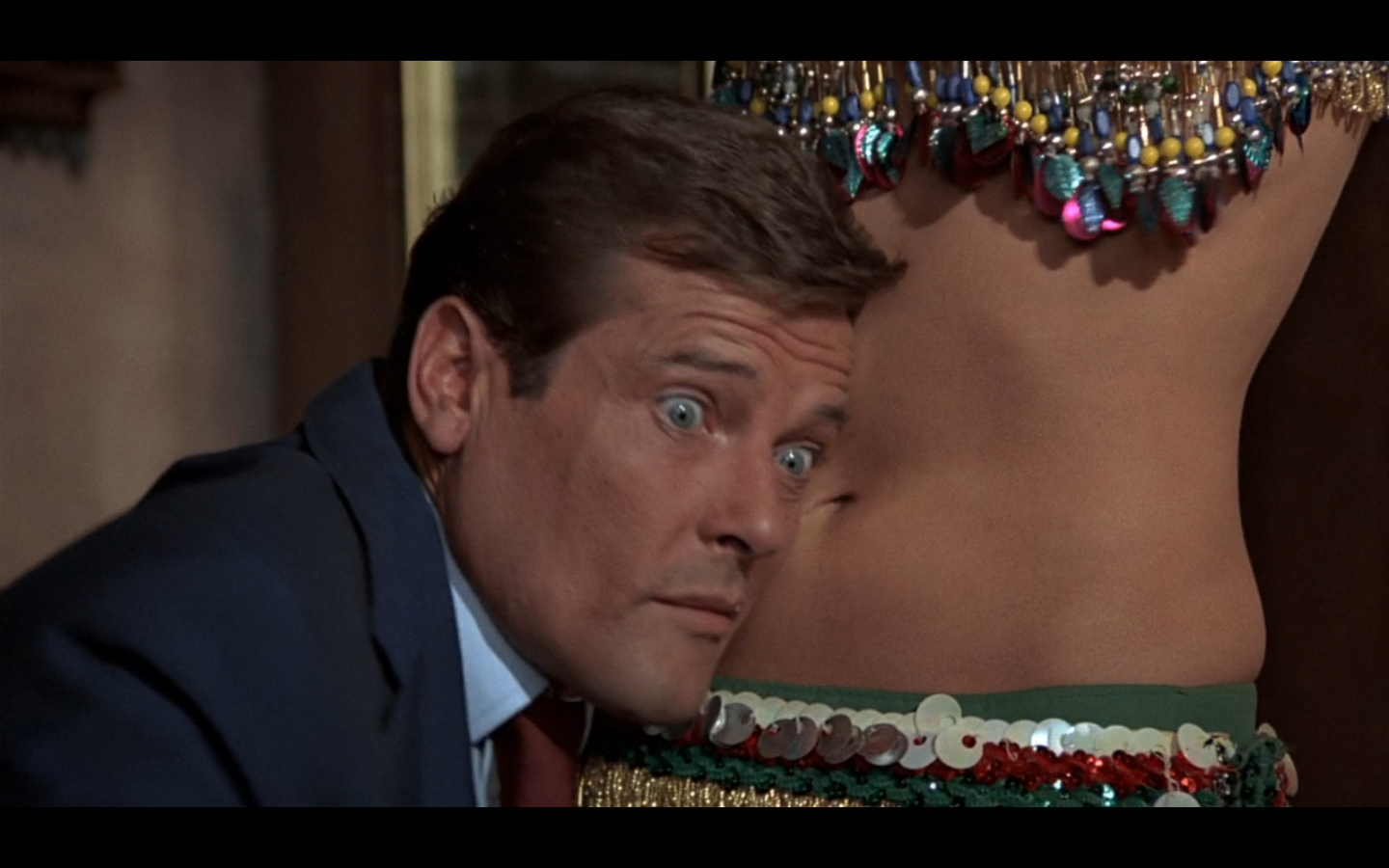 The+Man+With+The+Golden+Gun+Roger+Moore+swallow.png