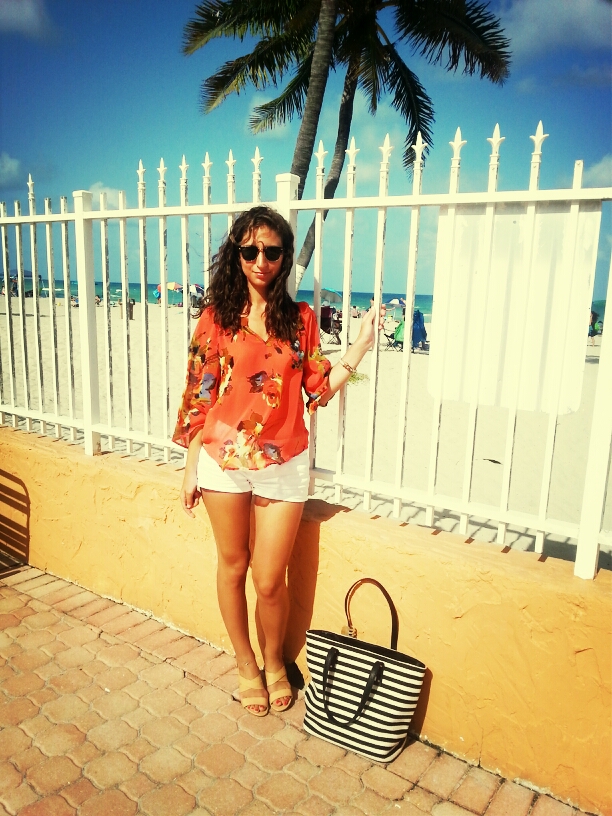 miami beach floral orange top white shorts rayban clubmasters sunglasses curly hair