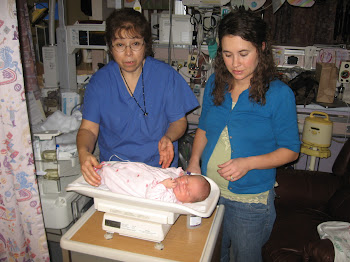 02/11/2011 Getting weighed by Linda one of the amazing nurses