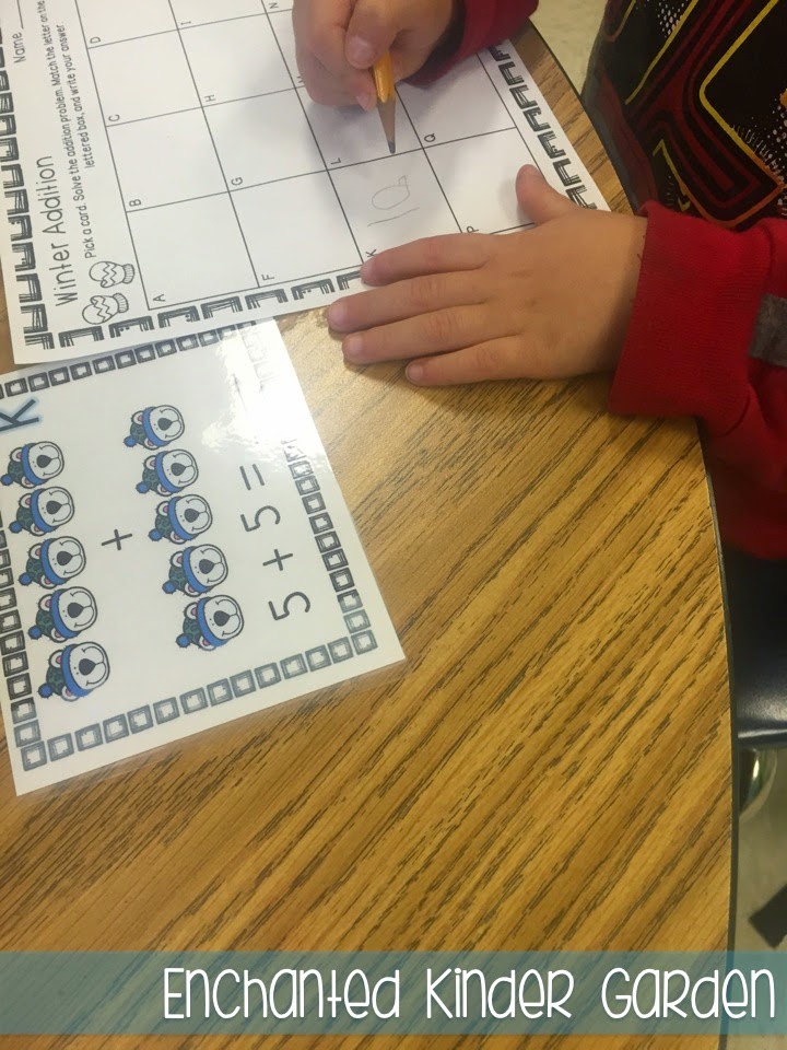 Sometimes Teacher-Authors who have stores on Teachers Pay Teachers get to swap products to test things out in their classrooms -- we like to call this Trade and Grade! This blog post is all about how I was able to try two kindergarten or primary grades resources created by Elyse from for Apples. Click through to read about her fantastic task cards and Winter Print-and-Go literacy resource! This is a photograph of a kindergarten math task card activity.