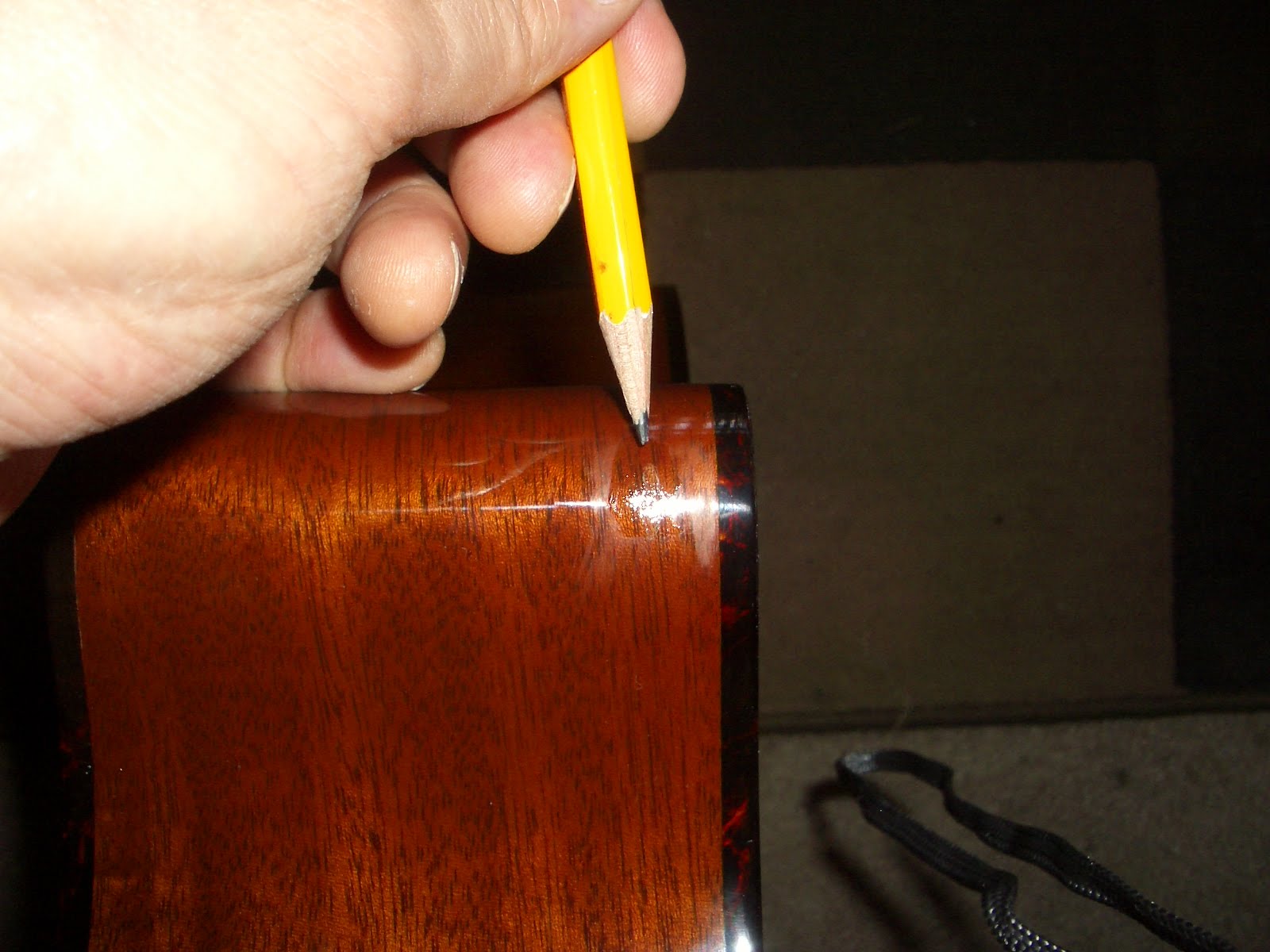 Guitar Snob Fixing a Dented Poly coated guitar