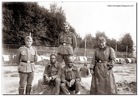 Germans with North African most probably Senegalese French POW  St. Cloud