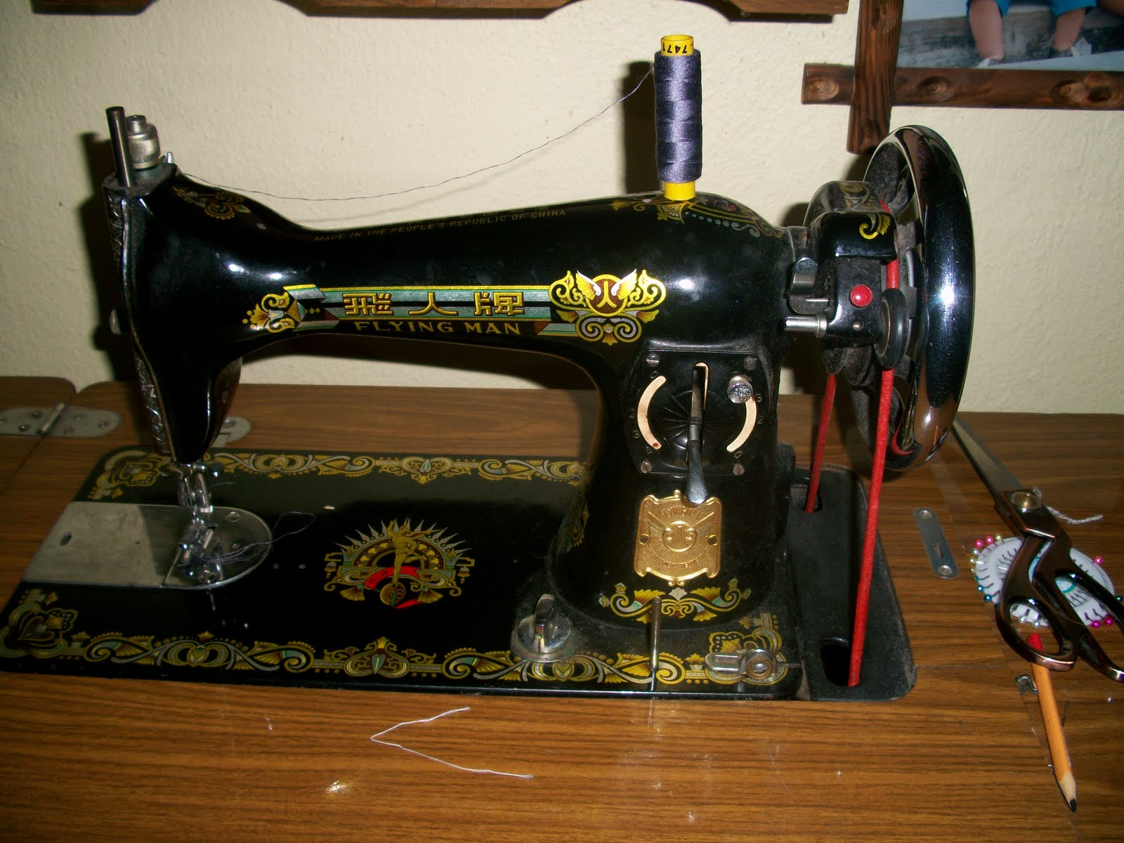 collectible items Vintage Flying Man Sewing Machine