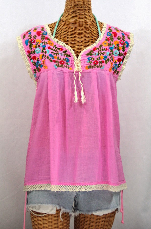 http://www.sirensirensiren.com/shop/new!-embroidered-peasant-tops/marbrisa-sleeveless-peasant-blouse/embroidered-sleeveless-mexican-blouse-marbrisa-bubblegum