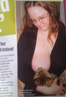 Women+breastfeeding+cat